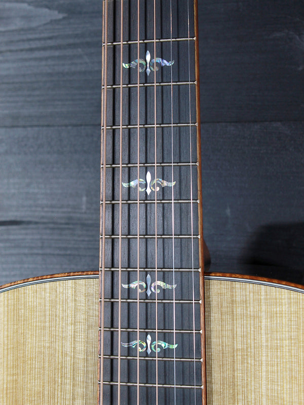 Belle Fleur fretboard inlay on Taylor custom acoustic guitar