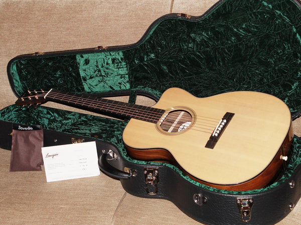Bourgeois Soloist OMC boutique acoustic guitar available at Tobias Music deluxe hardshell case included 