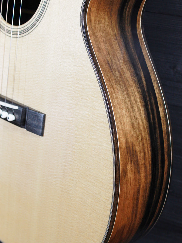 Bourgeois Soloist OMC boutique acoustic guitar available at Tobias Music side angle view