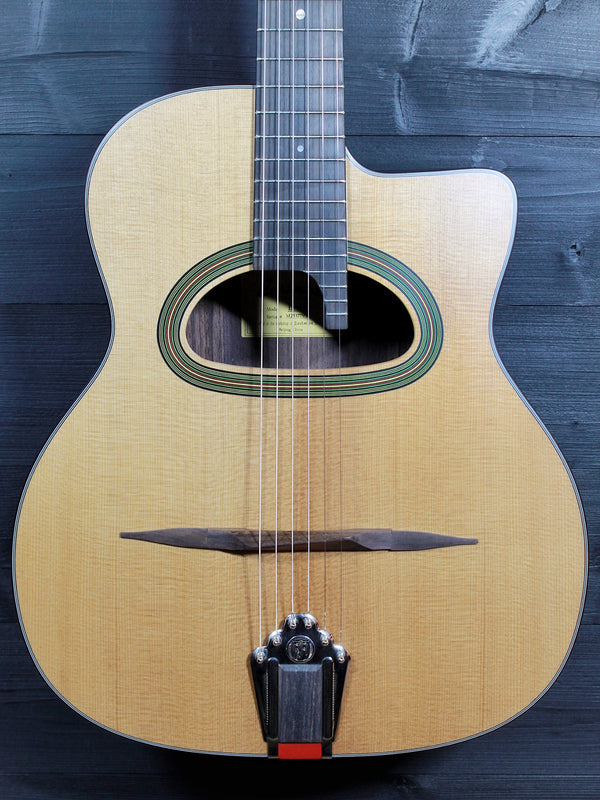 Eastman DM3 Grande Bouche Gypsy Jazz Acoustic Guitar with solid Sitka spruce top and traditional D-hole design at Tobias Music.