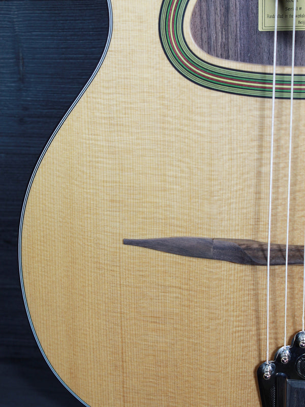 Eastman DM3 Grande Bouche Gypsy Jazz Acoustic Guitar with solid Sitka spruce top and traditional D-hole design at Tobias Music.