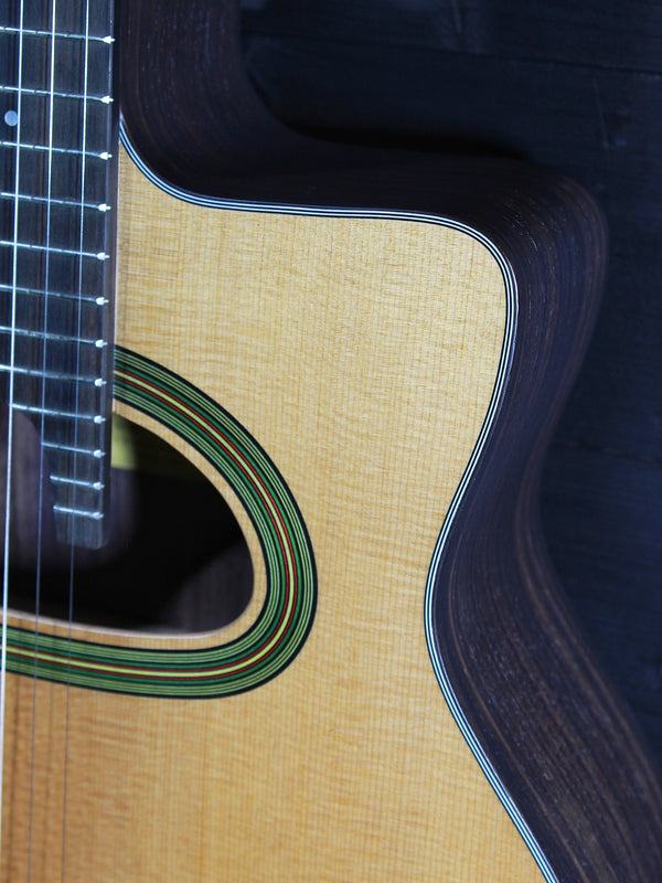 Eastman DM3 Grande Bouche Gypsy Jazz Acoustic Guitar with solid Sitka spruce top and traditional D-hole design at Tobias Music.