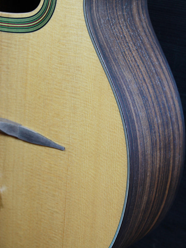 Eastman DM3 Grande Bouche Gypsy Jazz Acoustic Guitar with solid Sitka spruce top and traditional D-hole design at Tobias Music.