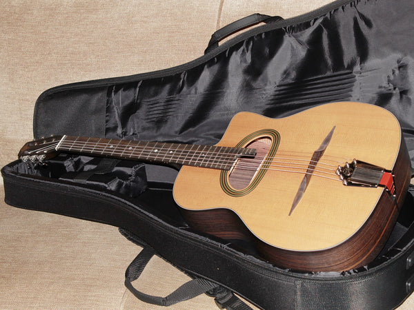 Eastman DM3 Grande Bouche Gypsy Jazz Acoustic Guitar with solid Sitka spruce top and traditional D-hole design at Tobias Music.