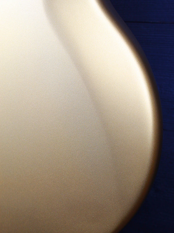Close-up of Eastman Fullertone Offset Gold finish body