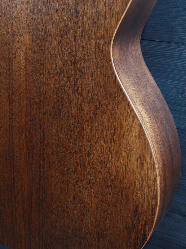 Lower bout back view of Martin 000-15 StreetMaster showing its solid mahogany back