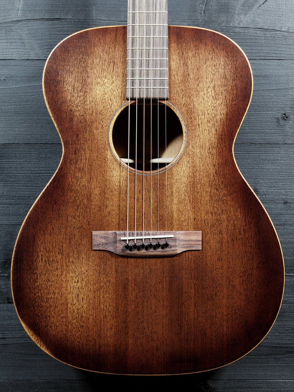 Front view of Martin 000-15 StreetMaster acoustic guitar featuring its weathered StreetMaster finish