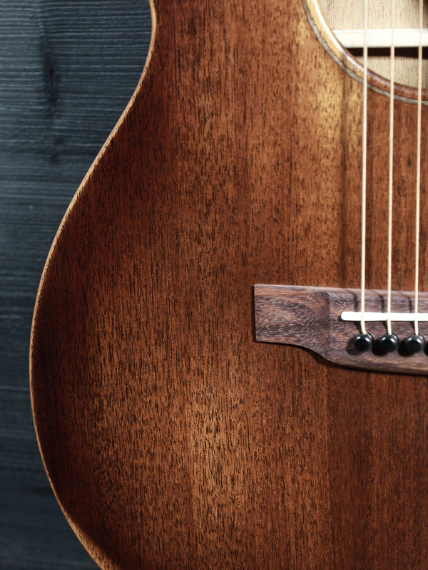Close-up of the lower bout on top of the Martin 000-15 StreetMaster all-mahogany guitar 