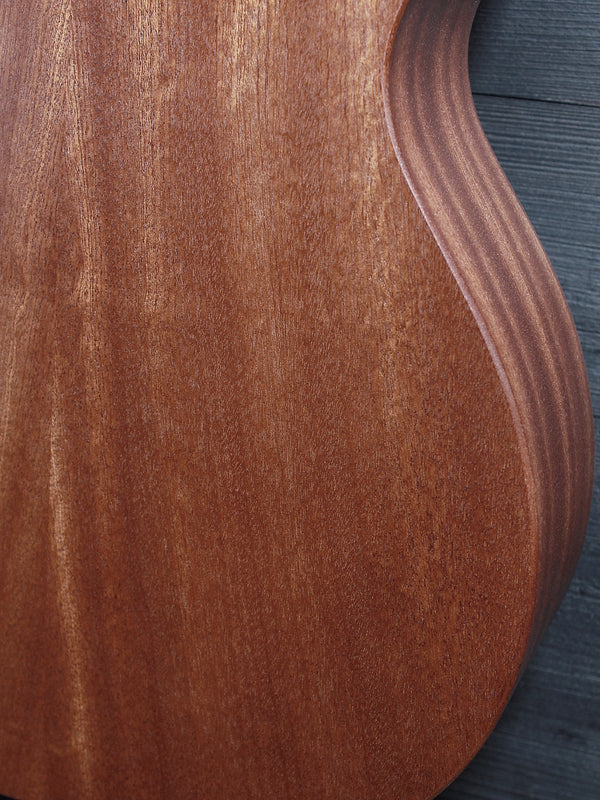 Back of Martin 000-Jr acoustic guitar featuring solid Sapele wood Showing lower bout