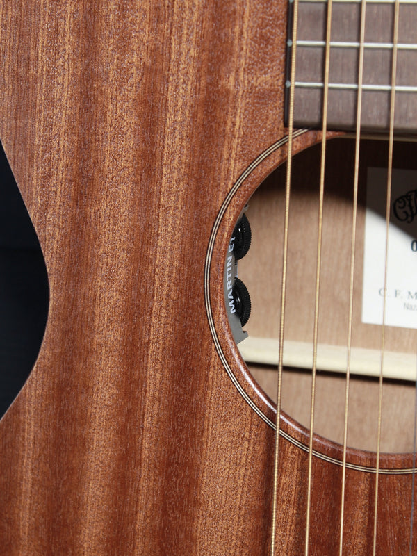 Close-up of the solid Sapele top on the Martin 000-Jr guitar With Martin E1 soundhole electronics
