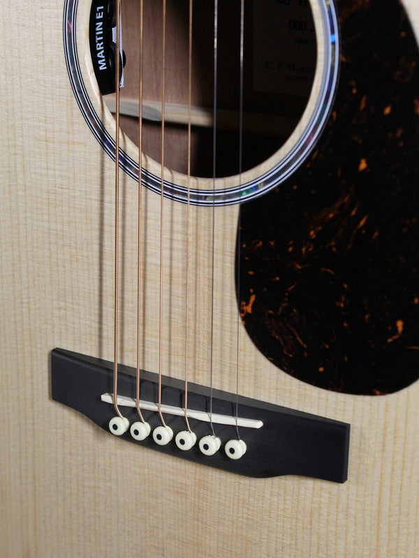    Martin 000C Jr-E acoustic-electric guitar bridge and sadde