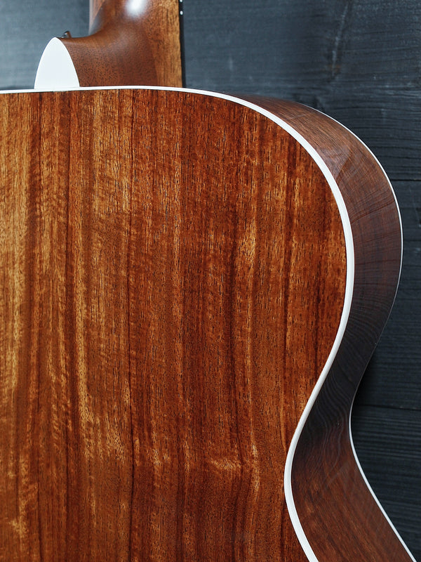 Martin 000E Retro Plus Granadillo guitar side view with back view

