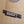 Load image into Gallery viewer, Martin 0012-28 Modern Deluxe 00 12-fret acoustic guitar showing bridge and saddle showing Bear claw spruce
