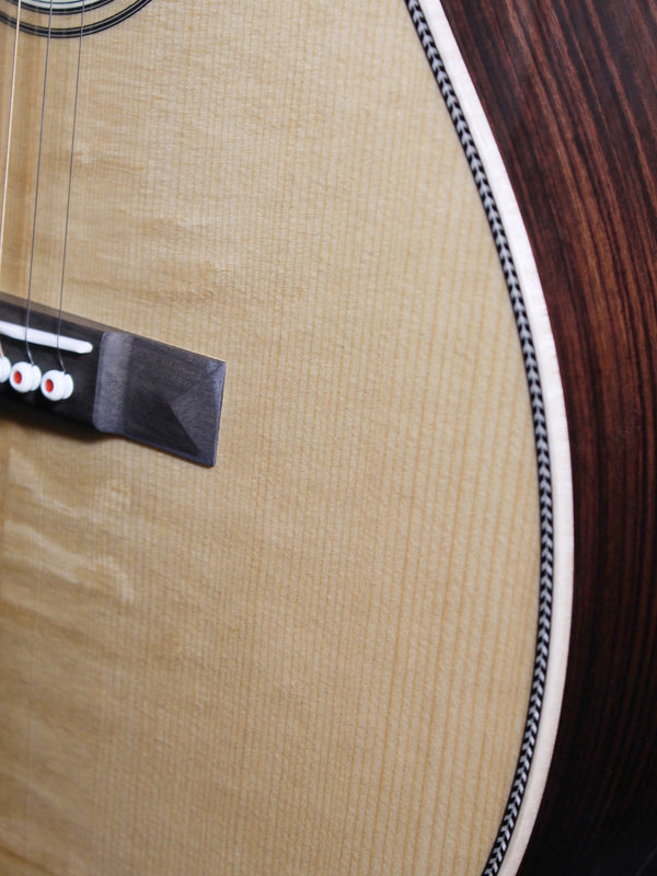 Martin 0012-28 Modern Deluxe 00 12-fret acoustic guitar lower bout Bear claw spruce top