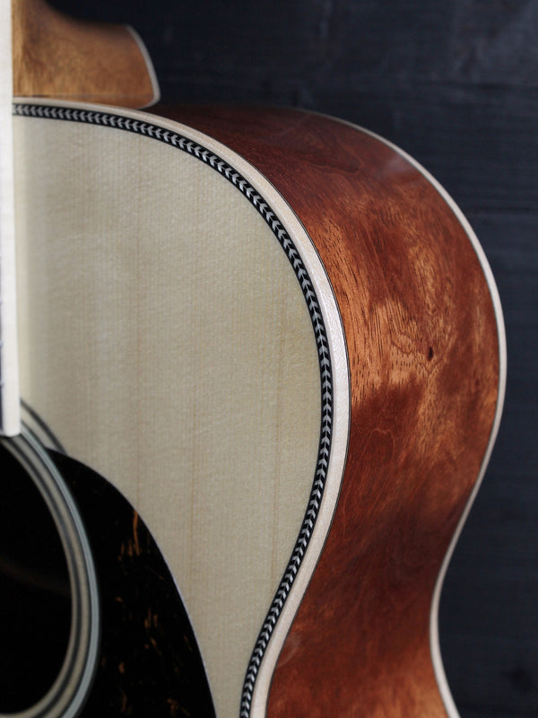 Martin Custom OM acoustic guitar with High Altitude Swiss Spruce top Bubinga sides.