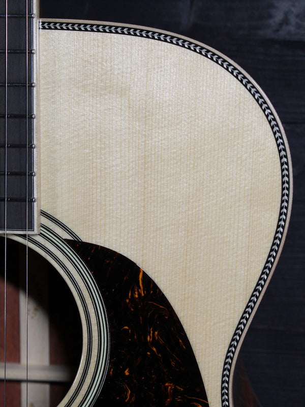 Martin Custom OM acoustic guitar with High Altitude Swiss Spruce top upper bout with Herringbone trim