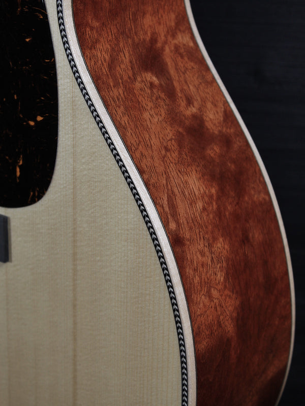 Martin Custom OM acoustic guitar with High Altitude Swiss Spruce top bubinga sides with Herringbone trim