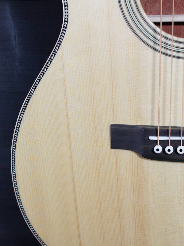 Martin Custom OM acoustic guitar with High Altitude Swiss Spruce top lower bout