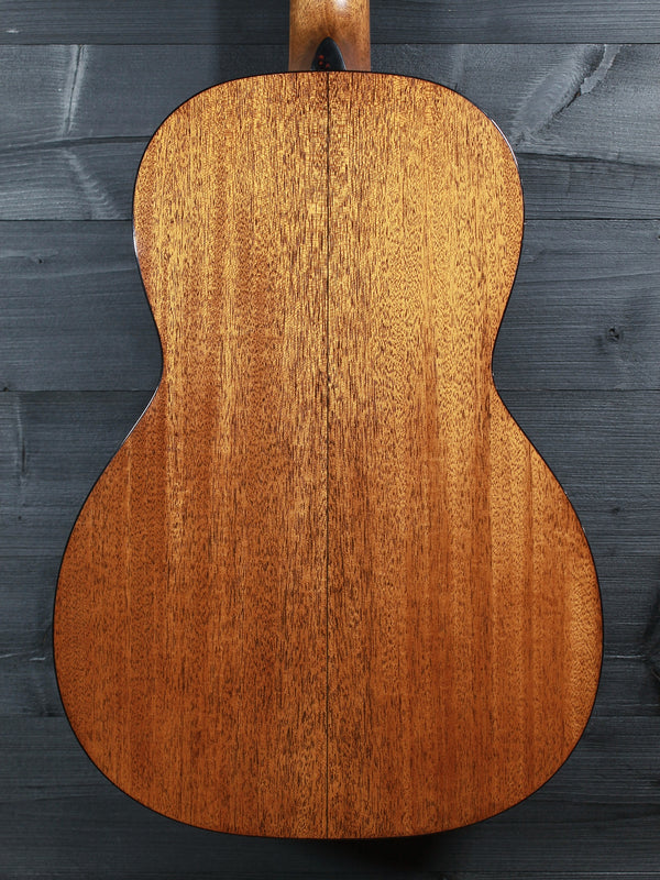  Close up view of back of the Martin Custom Shop 00-12 Fret featuring solid mahogany tonewood.