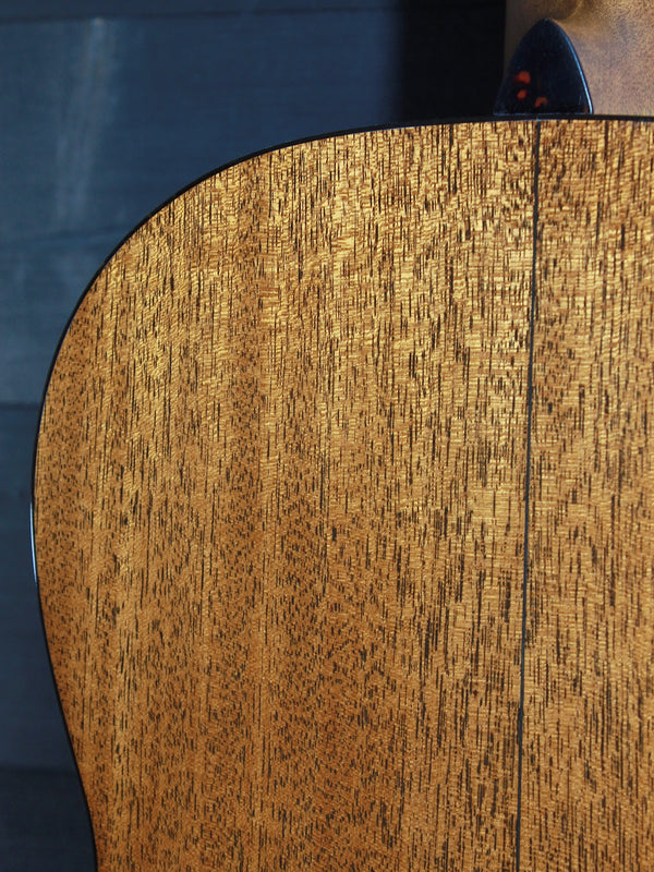 Back of the Martin Custom Shop 00-12 Fret featuring solid mahogany tonewood golden brown coloring.