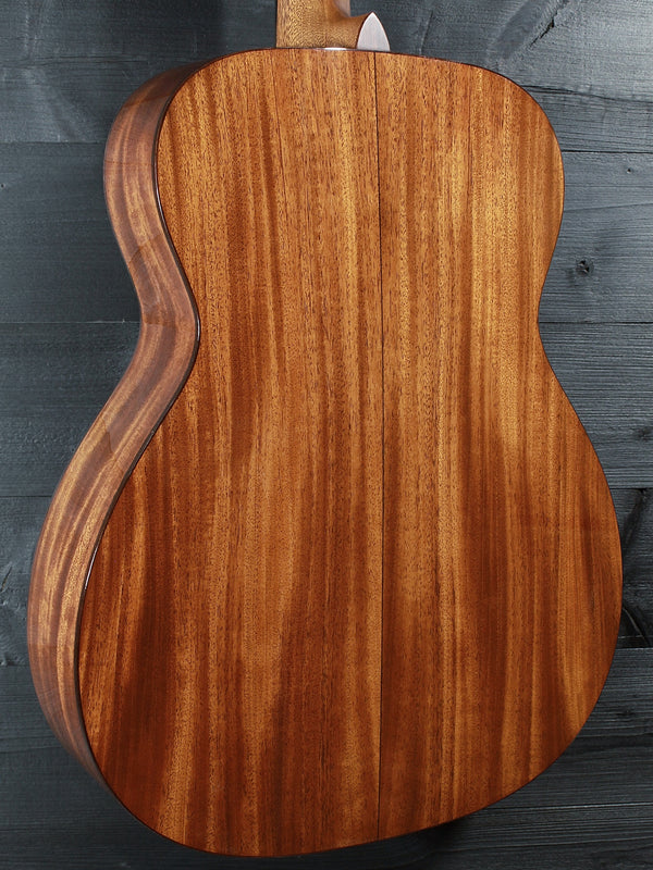 Back of Martin Custom Shop 0000/M guitar showcasing Sinker Mahogany wood grain back glamour shot