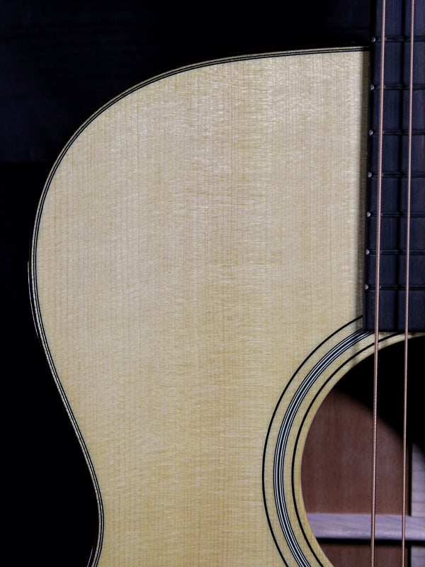 Certified European Spruce top with Aging Toner on Martin Custom Shop acoustic guitar close up upper bout