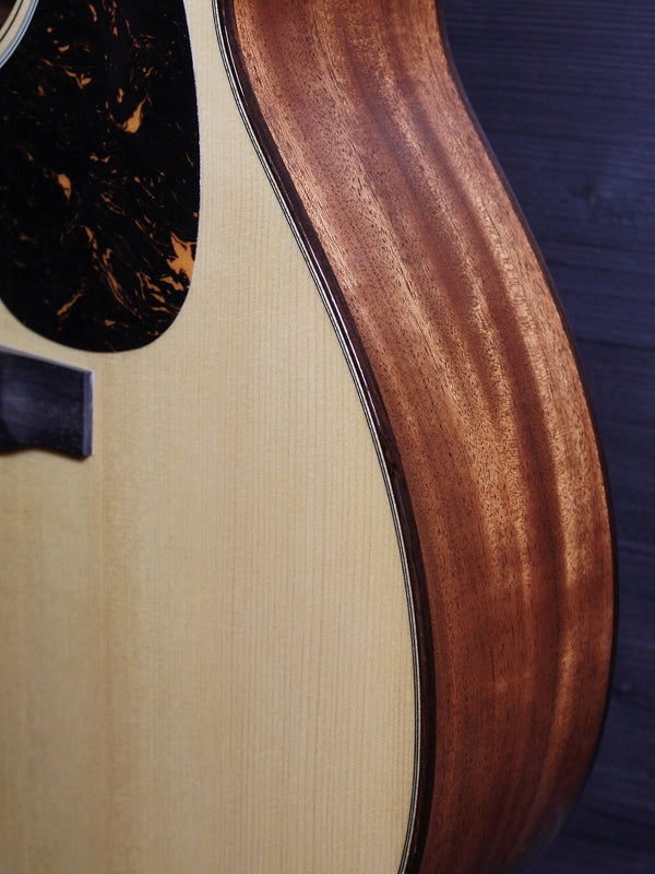 Certified European Spruce top with Aging Toner on Martin Custom Shop acoustic guitar showing top and sides