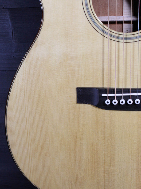 Certified European Spruce top with Aging Toner on Martin Custom Shop acoustic guitar close up wood grain