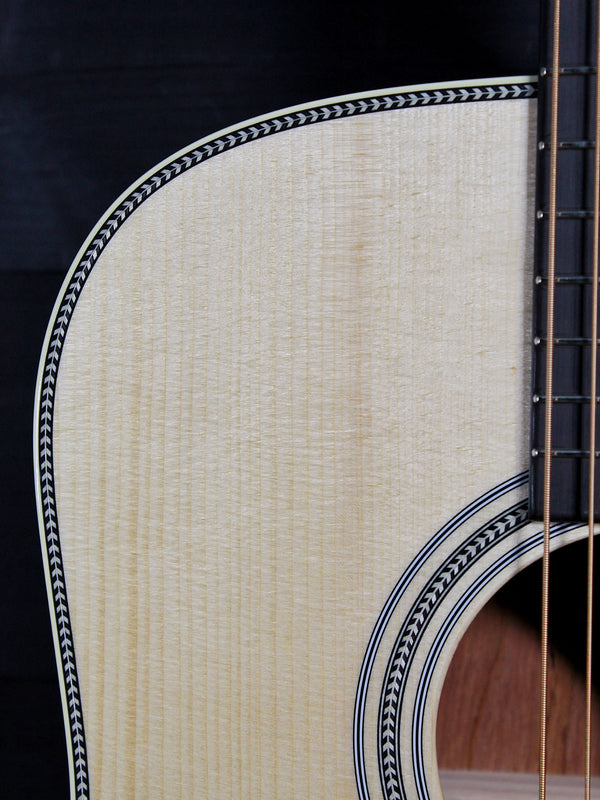 Martin Custom Shop Dreadnought with Adirondack Spruce top and Guatemalan Rosewood front view with herringbone 