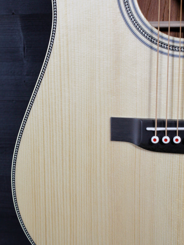 Martin Custom Shop Dreadnought with Adirondack Spruce top and Guatemalan Rosewood front lower bout with herringbone 