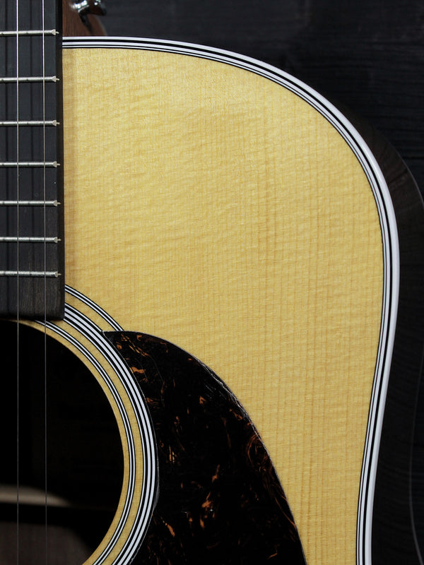 Martin D-13E Road Series acoustic-electric guitar with solid spruce top wood grain