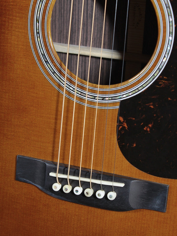 Detail of the Martin D-41 dreadnought body and top showing bridge and saddle