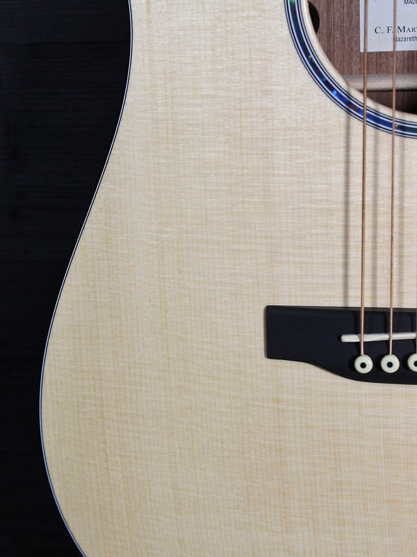 Martin D Jr-E acoustic electric guitar showing wood grain