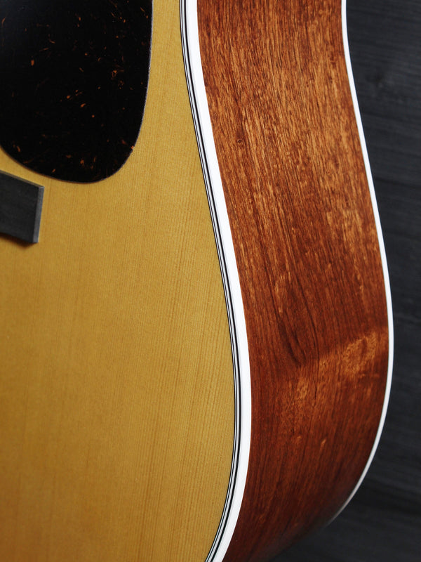 Martin DE Retro Plus Granadillo spruce top acoustic guitar lower bout showing sides.