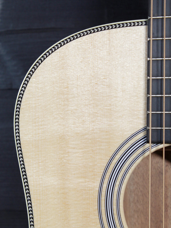 Martin O’ahu HG-28 sloped-shoulder acoustic guitar body upper bout herringbone trim