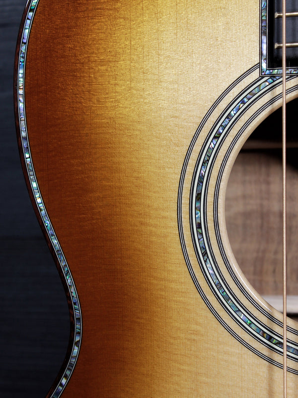 Martin O’ahu K-42 Hibiscus reclaimed Sitka spruce top close-up soundhole and rosette.