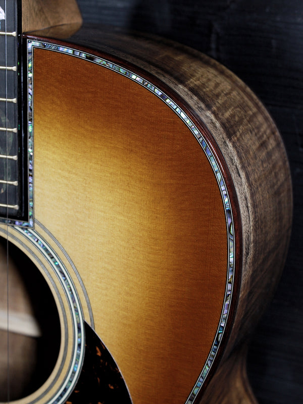 Martin O’ahu K-42 Hibiscus acoustic guitar front view abalone top trim