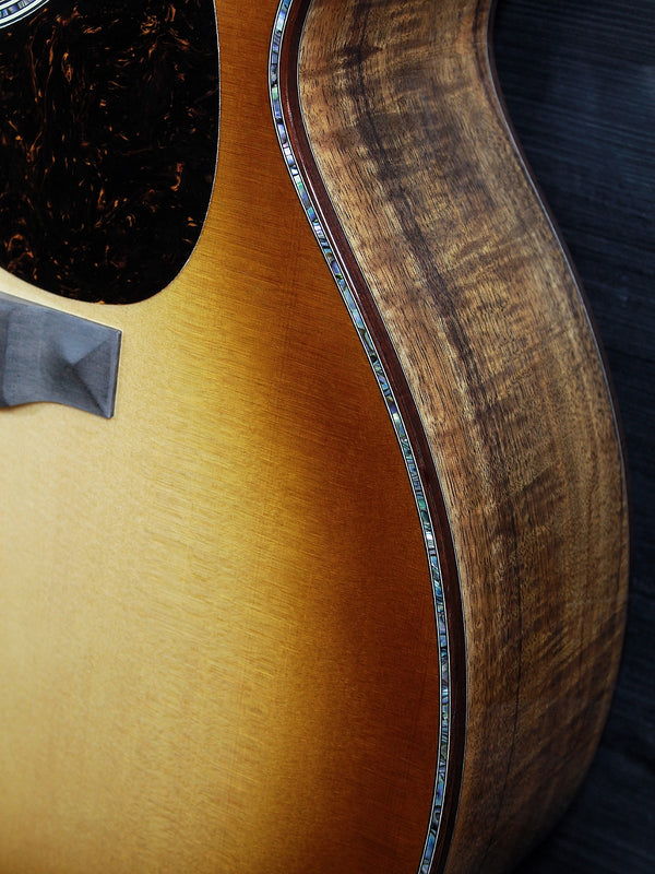 Martin O’ahu K-42 Hibiscus acoustic guitar front view showing koa sides