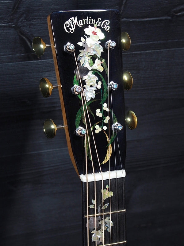 Martin O’ahu K-42 Hibiscus headstock close-up showing detailed inlay.