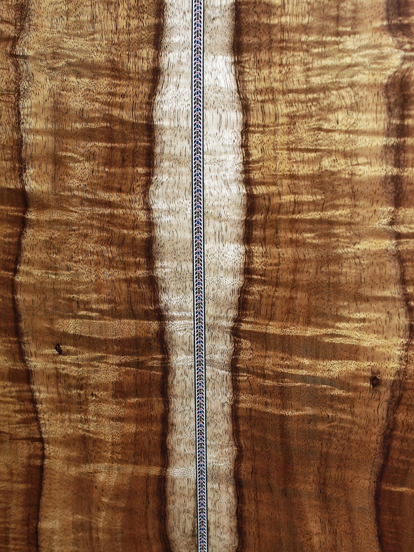 Close up Martin O’ahu K-42 Hibiscus Hawaiian koa back with heart wood.