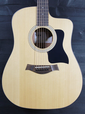 Taylor 110ce acoustic-electric guitar front view with solid Sitka spruce top