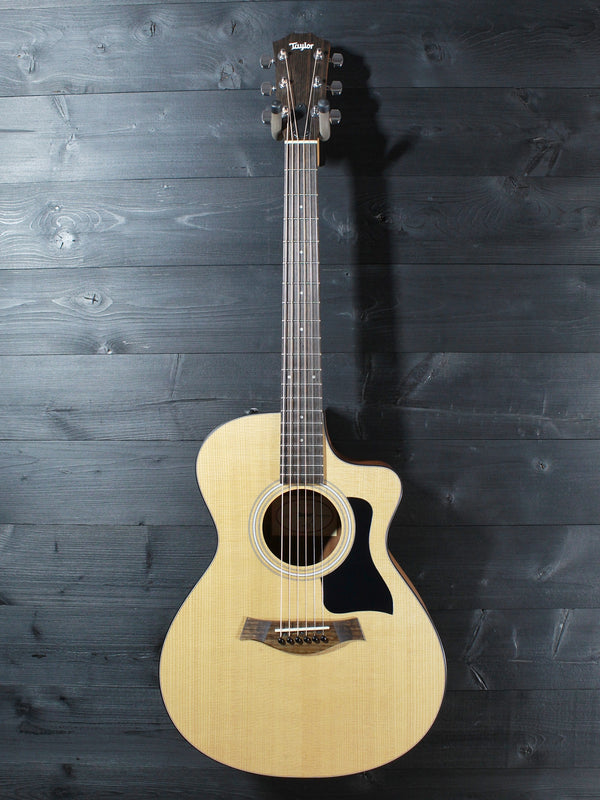 Taylor acoustic guitar with cutaway 
