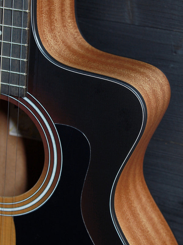 Taylor 114ce Dark Tobacco Shaded Edgeburst acoustic-electric guitar front view of cutaway.