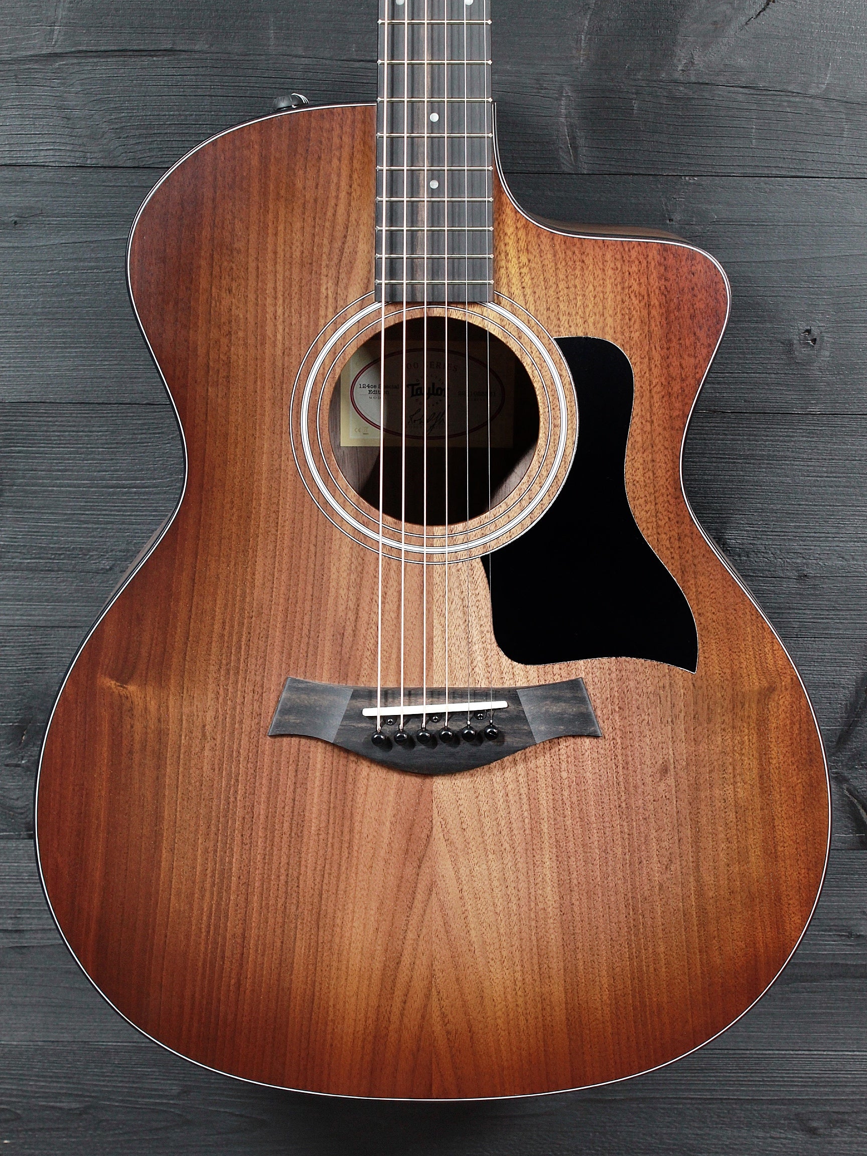 Taylor 124ce Walnut Special Edition Grand Auditorium Acoustic-Electric –  Megatone Music