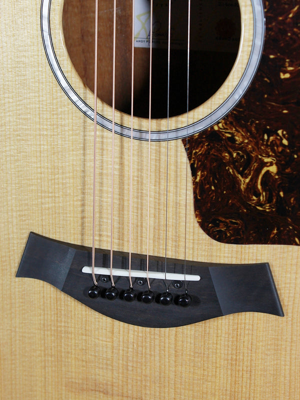 Solid torrefied spruce top on Taylor 214ce-K Deluxe with bridge and sadde