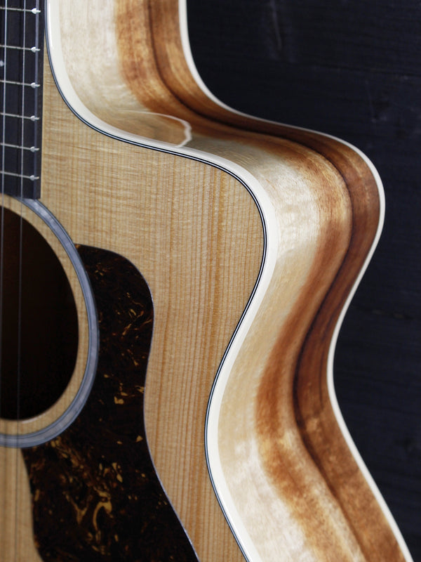 Solid torrefied spruce top on Taylor 214ce-K Deluxe with cutaway