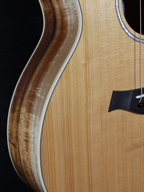 Solid torrefied spruce top on Taylor 214ce-K Deluxe with koa sides