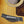 Load image into Gallery viewer, Ebony bridge and saddle on Taylor 214ce
