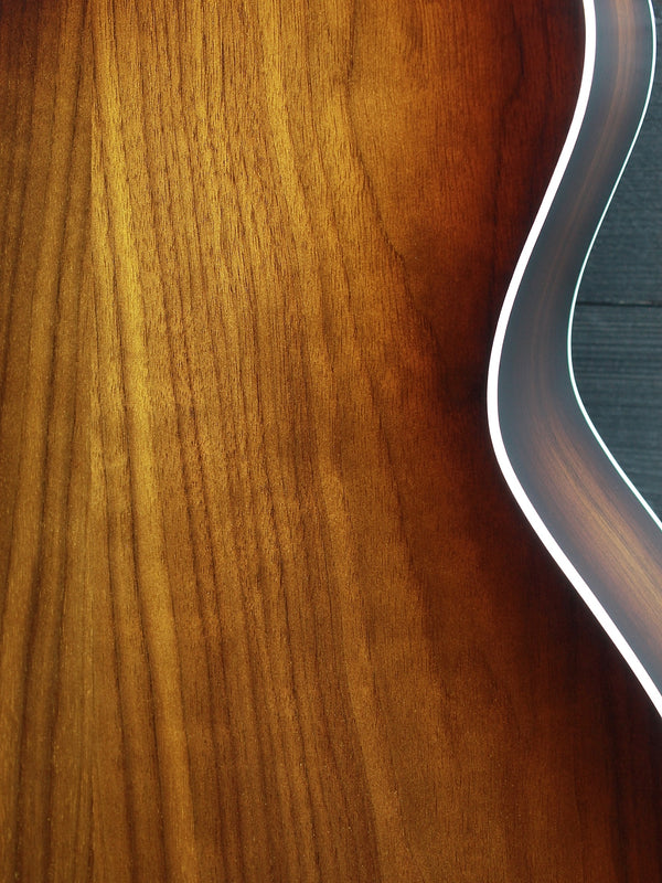 Layered walnut back on Taylor 214ce Shaded Edgeburst