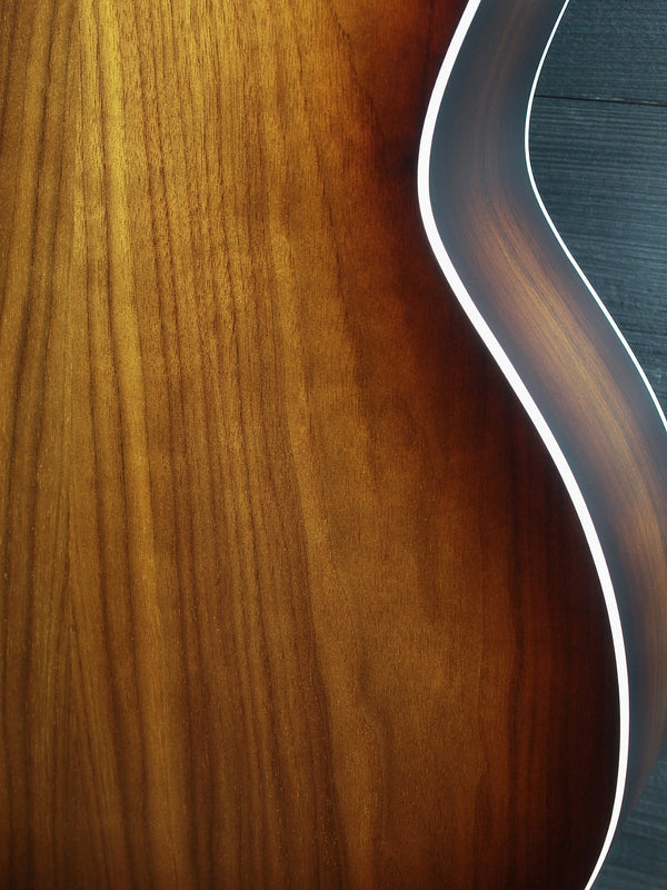 Layered walnut back on Taylor 214ce Shaded Edgeburst